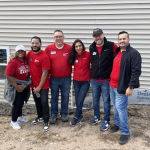 Habitat for Humanity and KeyBank volunteers shown in a group photo.