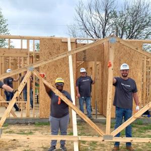 Group building a house