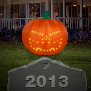 Jack 'O Lantern sitting on top of a stone marked 2013.