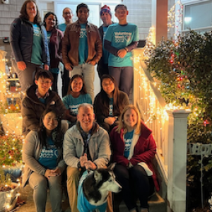 Holiday group photo on the steps of a home