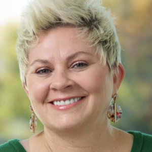 Headshot of a person smiling