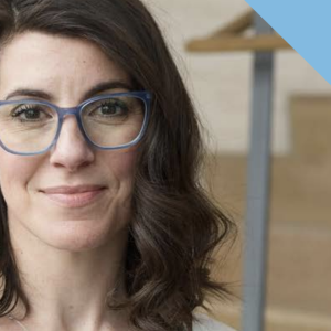 Headshot of a person wearing glasses