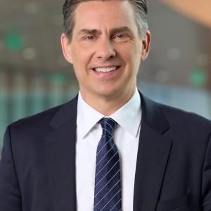 Headshot of Heath Monesmith, president and chief operating officer, Electrical Sector