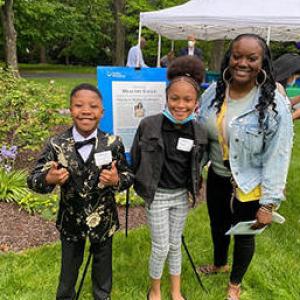 Two kids and one adult attending Healthy NewsWorks hosted their 2022 Film and Book Fest