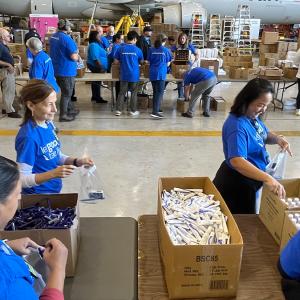 Volunteers packing hygiene kits