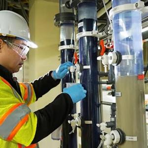 person working on machines