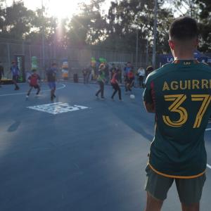 Aguirre watching kids play soccer at new pitch