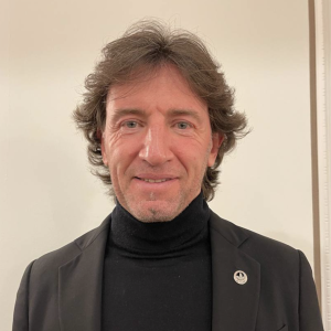 Headshot of a person smiling