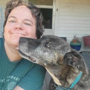 Hillary with her dog.