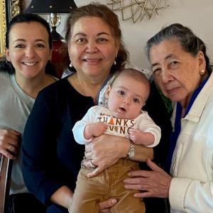 Brina R. and family holding baby
