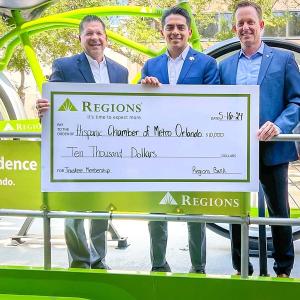 People holding a cheque 