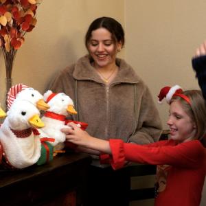 Family shown with the Aflac Duck. 