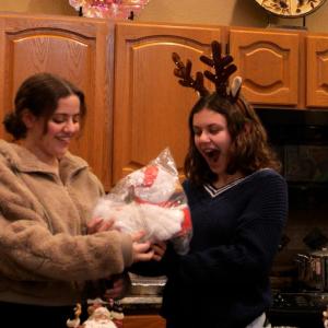 The Goodhue family shown with a Holiday Duck.
