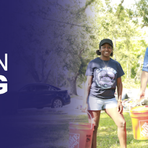 The Home Depot Operation Blessing. Family shown carrying orange buckets.