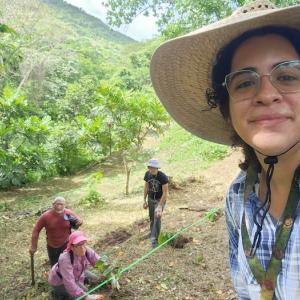 Coral Gonzalez shown with her garden.