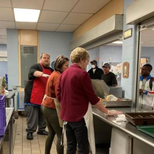 People baking in commercial kitchen