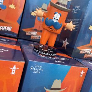 "Howdy Bobblehead" boxes, one out on display