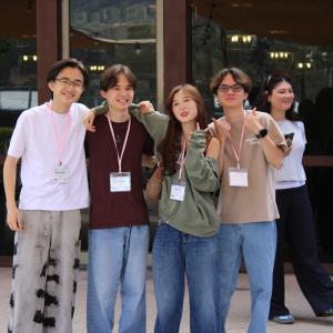 Participants pose for a group photo outside of Brookside at the Rose Bowl Stadium during a career development program.
