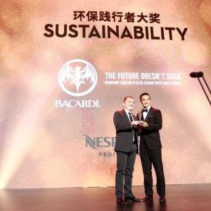 Adam Devermann pictured right accepts the Sustainability Award presented by Drink Magazine Bar Awards.