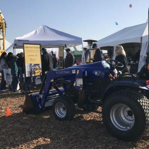 tractor outside near tents at the World Ag Expo 