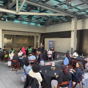 group listening to a speaker