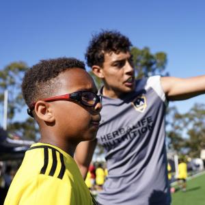Athletes from the United LA Girls Soccer Team joined Galaxy coaches in leading drills and engaging with the young players.