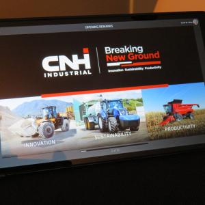 table reading "CNH Industrial Breaking New Ground" with images of tractors