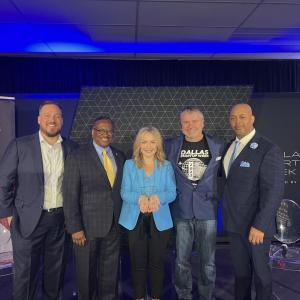 the panelists pose for a photo