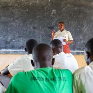 Patience teachers her club about nutrition.