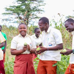 Patience and her fellow club members in the climate-smart school garden. 