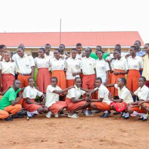 Patience and her team with their trophy from the Karamoja Green Schools regional debate. 