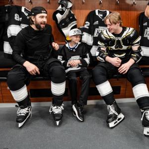 On game day, Joshua geared up to take the ice with the starting lineup.