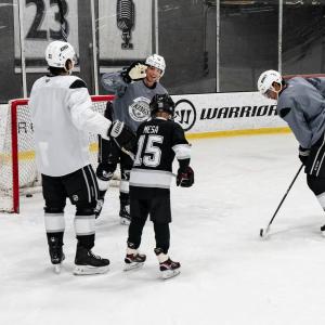 Joshua had the chance to step onto the ice to skate with the players after practice.