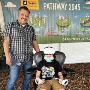 parent with a child wearing VR headset