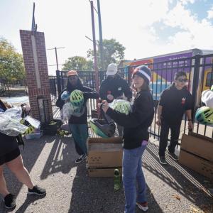 AEG employees helped outfit each student with the correct bike size and helmet. (Photo: Jon Angel)
