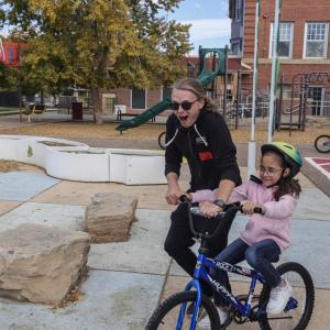 AEG employees helped teach the students how to ride a bike. (Photo: Jon Angel)