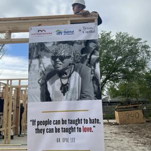 volunteers build the house