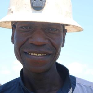 A 52-year-old farmer in the Lukanda Agriculture Camp greets our team. "Because of the dry spell, we will only be eating one meal per day," he tells me.