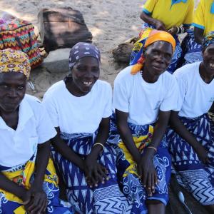 Action Against Hunger teaches farmers in Zambia how to grow drought-resistant crops.