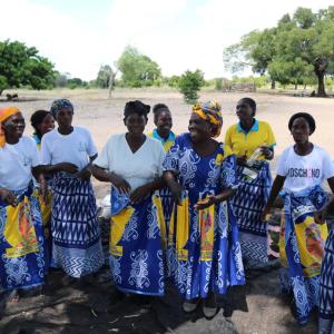 Mrs. Makina sings and dances alongside the other ladies in the Kaande Camp.
