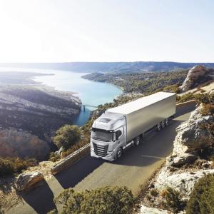 truck driving on scenic highway