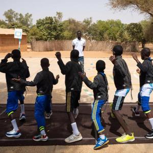 Group children participating in outdoor sport
