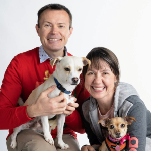 Daniel Grosu with his wife, Simona and their dogs, Simba (left) and Nala (right).