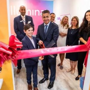 Ribbon cutting ceremony BizTown storefront.