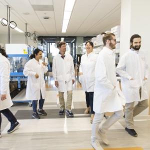 Illumina technicians in a lab.