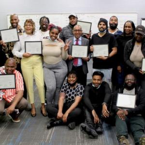 GRID interns shown with certificates.
