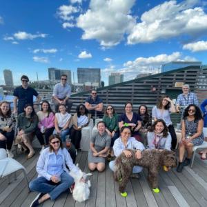 Embark Marketing Team seated outside their headquarters.