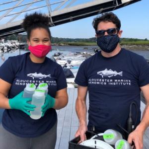 Research Scientist Tim O'Donnell teaches Gloucester Biotechnology Academy student Tamia Buckley proper water sampling techniques during her internship at GMGI.