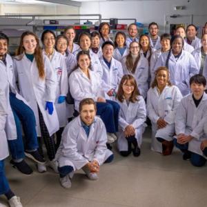Lab members gather in Admera’s clinical service laboratory. 