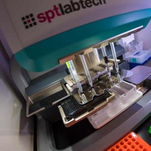 A pipetting robot dilutes samples into a plate for imaging in the Illumina Laboratory in Hubbs Hall.
